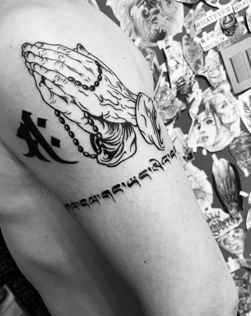 虔诚纹身图片_手臂纹身图案