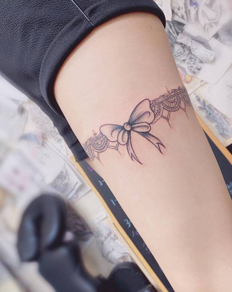 大腿蝴蝶结纹身图片_腿部纹身图案