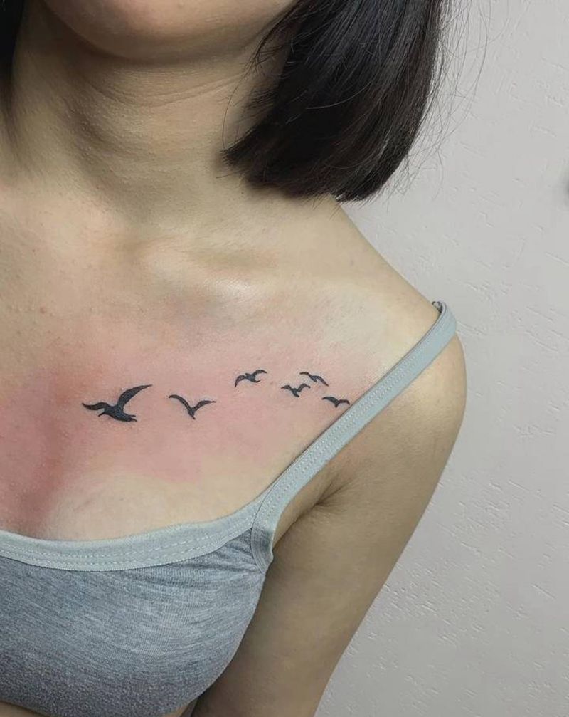 燕纹身图片_腹部胸部纹身图案