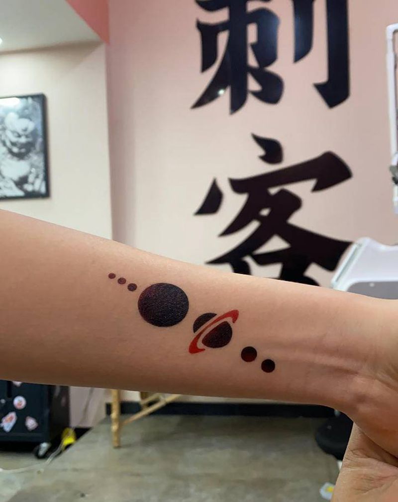 星球纹身图片_手臂纹身图案