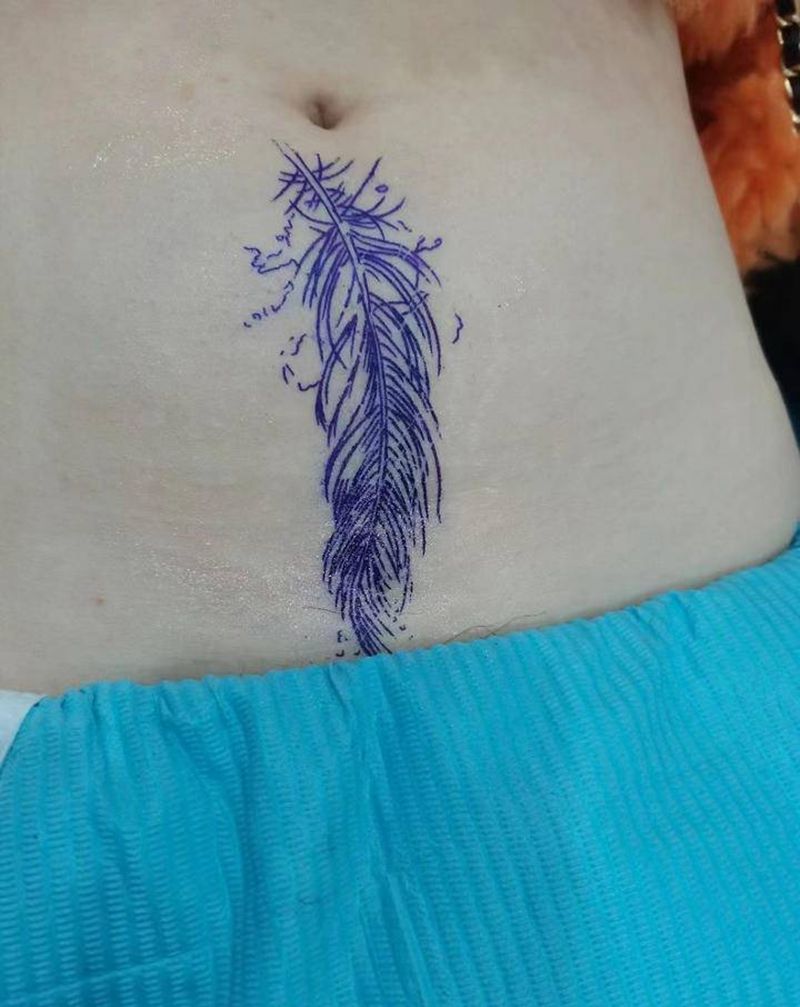 羽毛纹身图片_腹部纹身图案