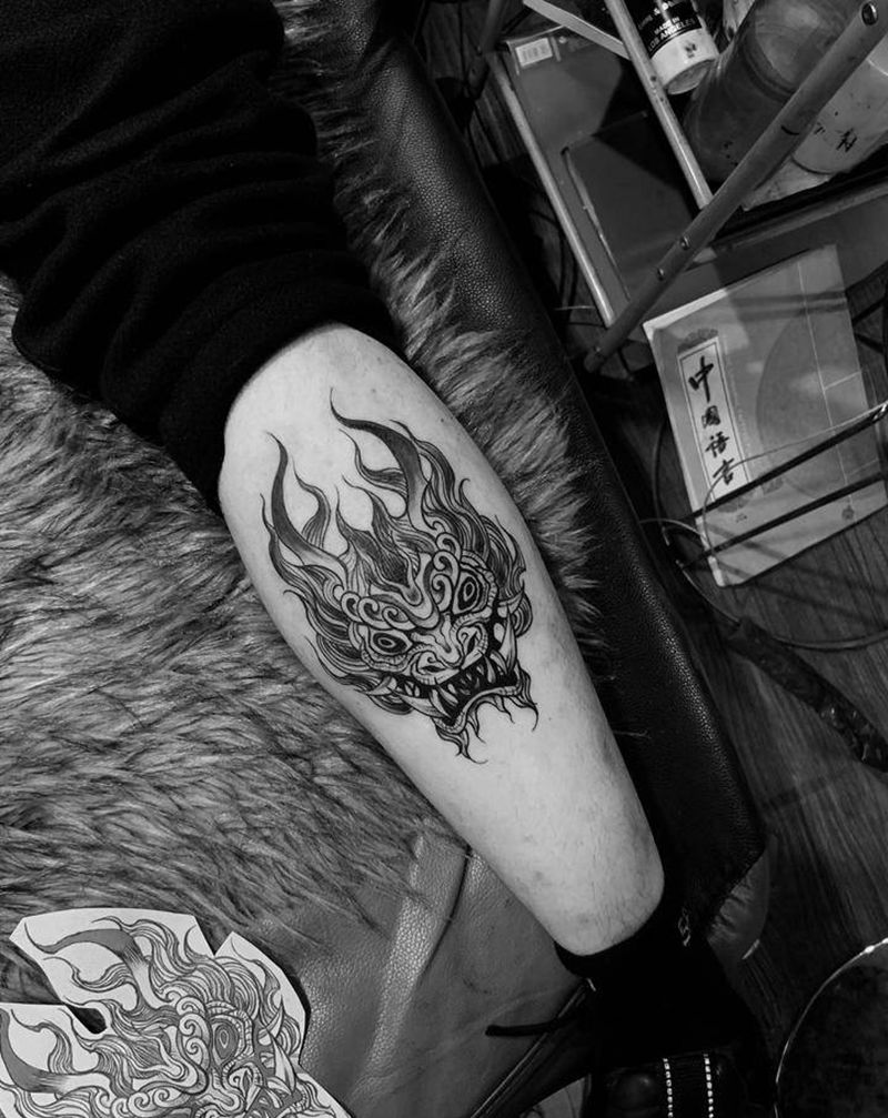 凶兽纹身图片_腿部纹身图案