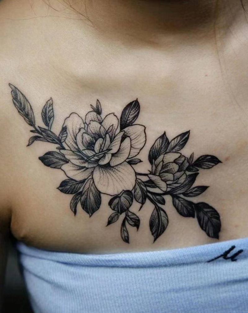 素花纹身图片_胸部纹身图案