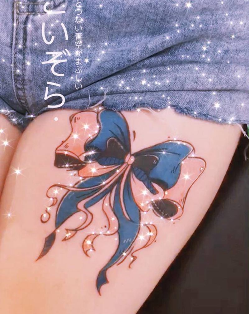 蝴蝶结纹身图片_腿部纹身图案