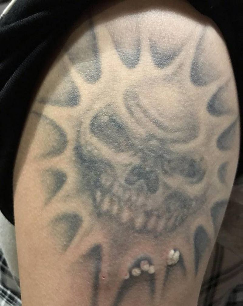 纹身清洗纹身图片_手臂纹身图案