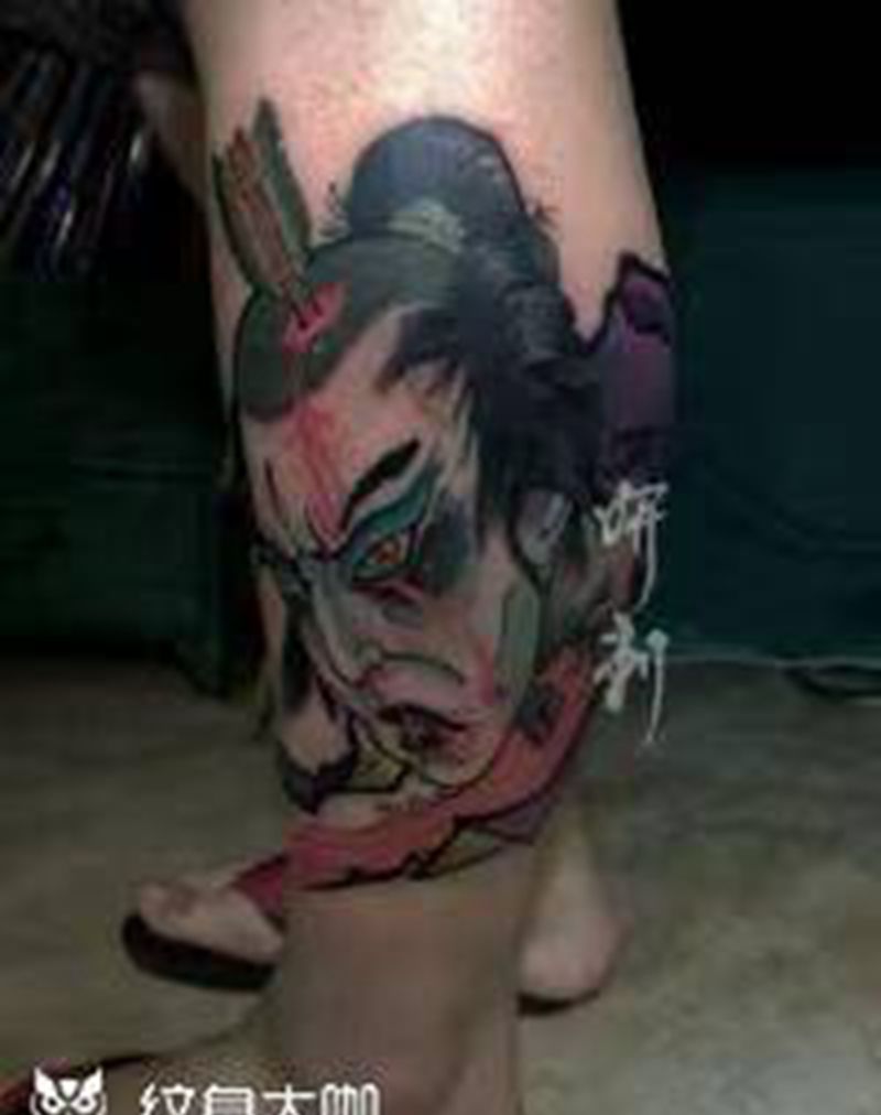 生首纹身图片_腿部老传统新传统生首纹身图案