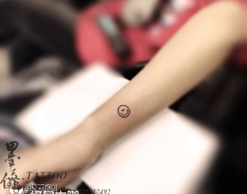 笑脸tattoo纹身图片_手臂纹身图案
