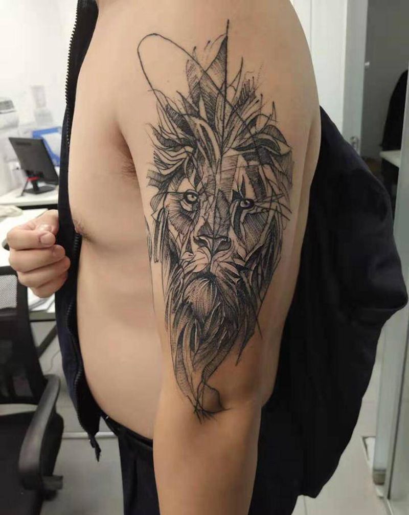 大臂#点刺狮子纹身图片_手臂点刺纹身图案