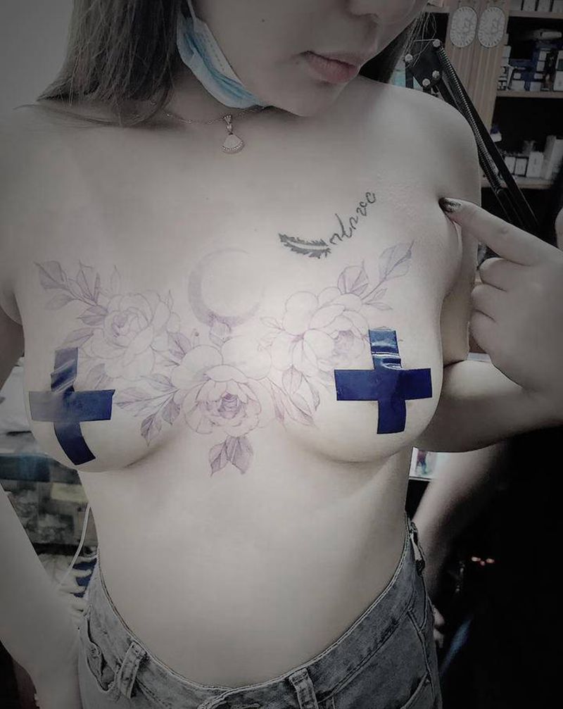 给美女遮盖妊娠纹纹身图片_胸部素花纹身图案