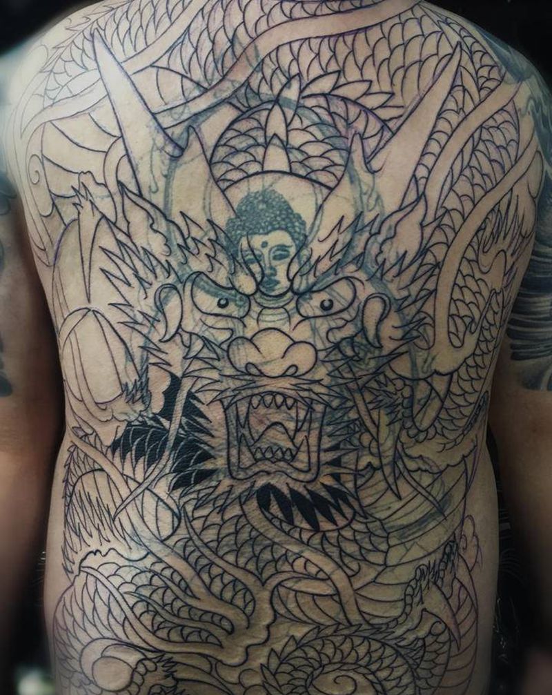 大龙遮盖佛待续纹身图片_背部老传统纹身图案
