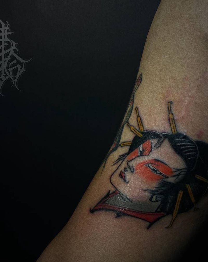 生首纹身图片_手臂老传统纹身图案