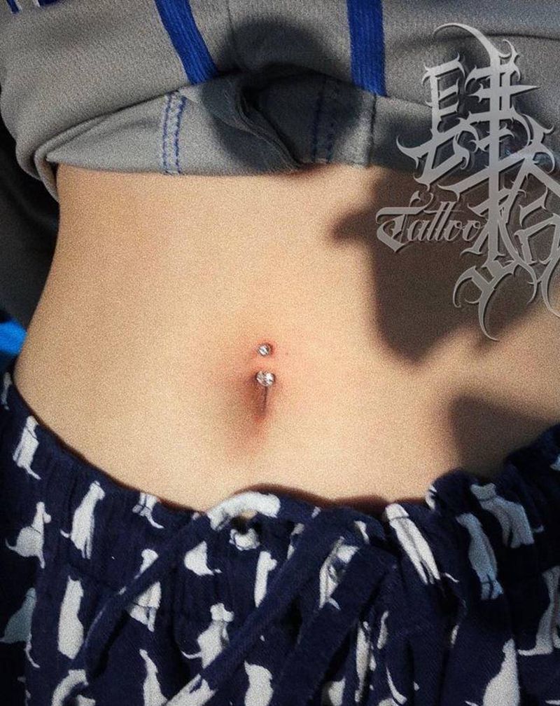 脐钉纹身图片_腹部纹身图案