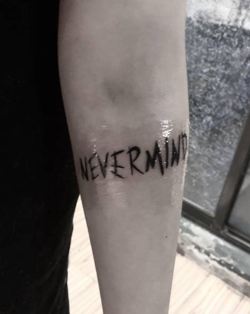 Nevermind纹身图片_花体字纹身图案