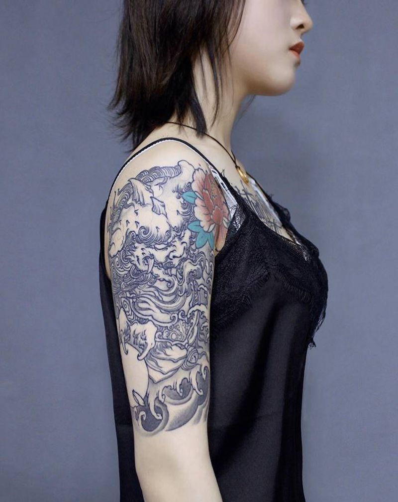 大臂唐狮纹身图片_手臂新传统唐狮中国风纹身图案