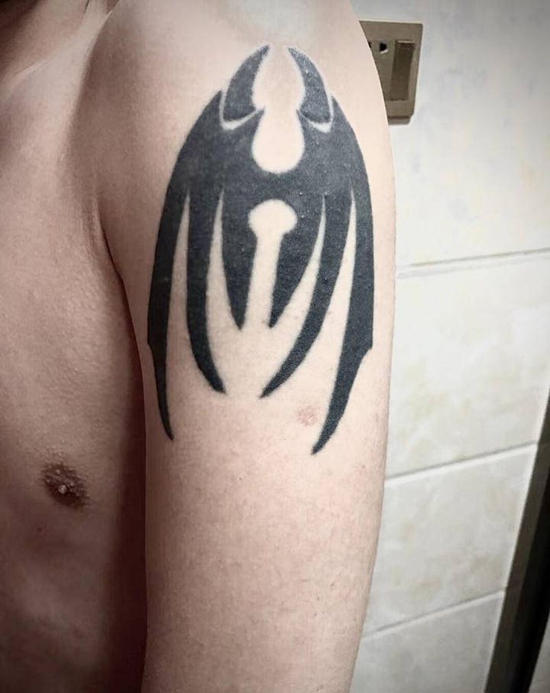 遮盖黑图腾纹身图片_手臂新传统鳌鱼纹身图案