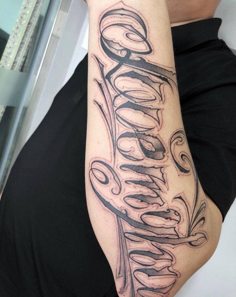 奇卡诺纹身图片_手部花体字纹身图案