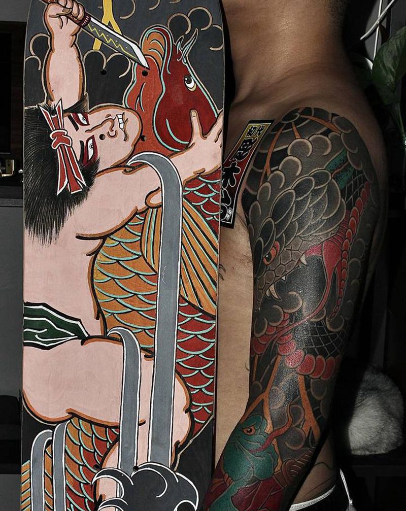 仙人与蛇纹身图片_手臂老传统花臂纹身图案