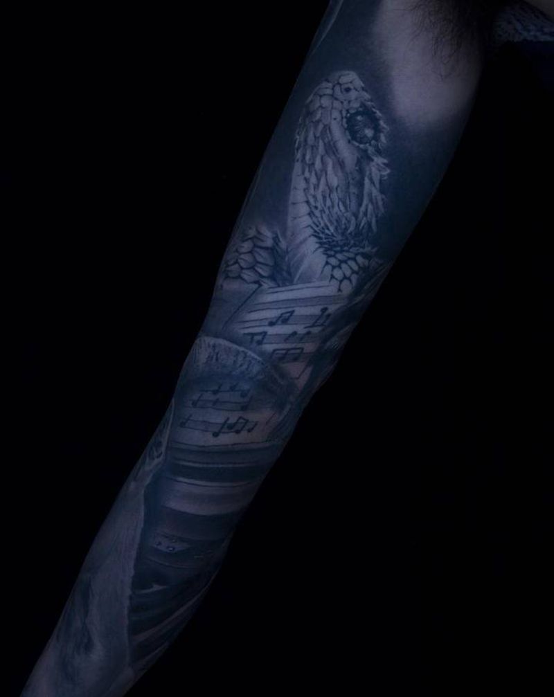 欧美花臂(遮盖失败纹身)恢复后纹身图片_手臂欧美写实动物猫头鹰蛇纹身图案