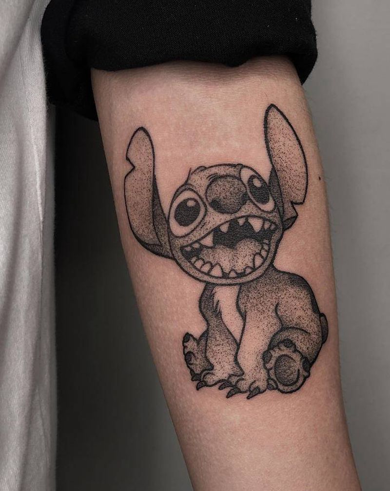 史迪仔纹身图片_手臂点刺纹身图案