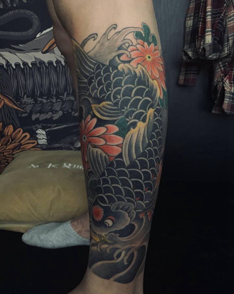 鱼纹身图片_腿部老传统纹身图案