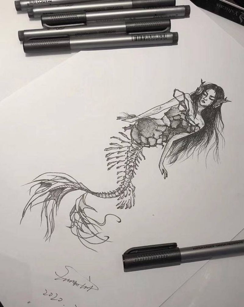 手稿-美人鱼纹身图片_几何点刺纹身图案