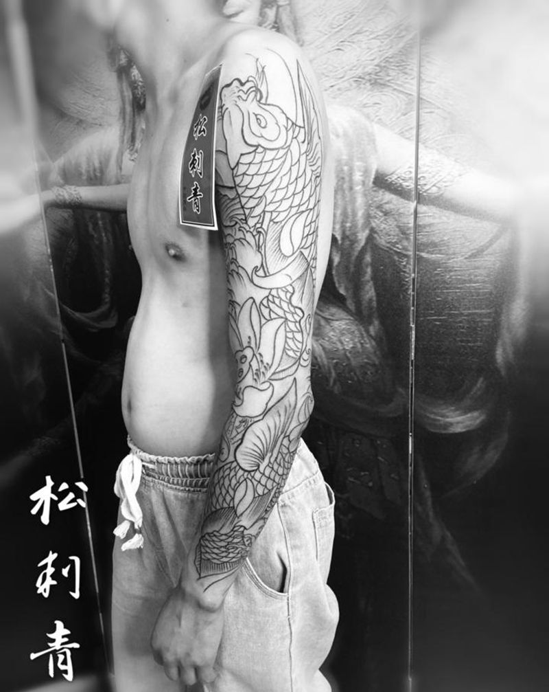 花臂鱼线条纹身图片_新传统纹身图案