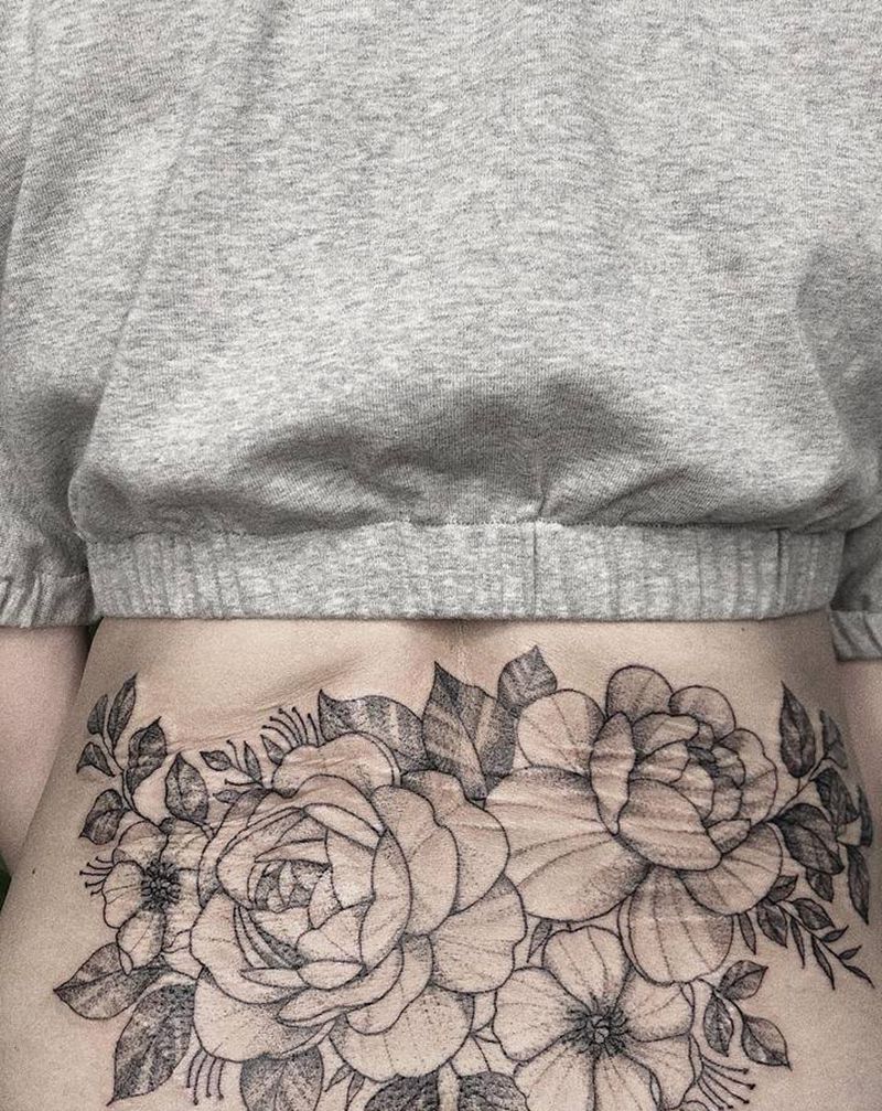 素花遮盖纹身图片_腰部纹身图案