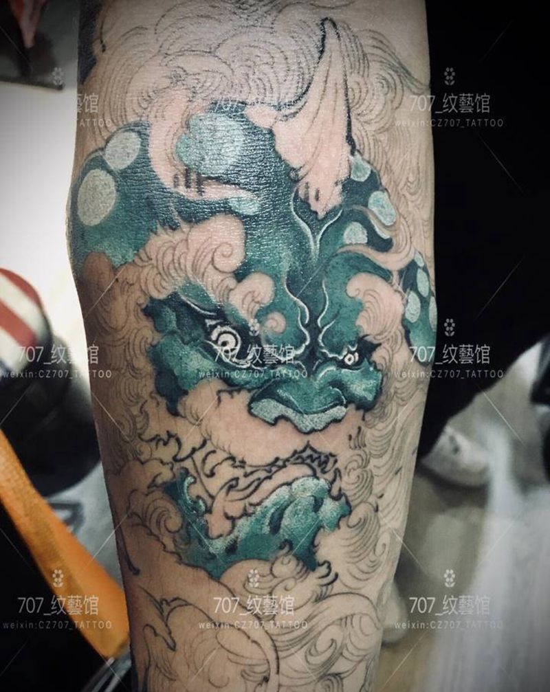 小臂唐狮未完成纹身图片_手臂新传统纹身图案