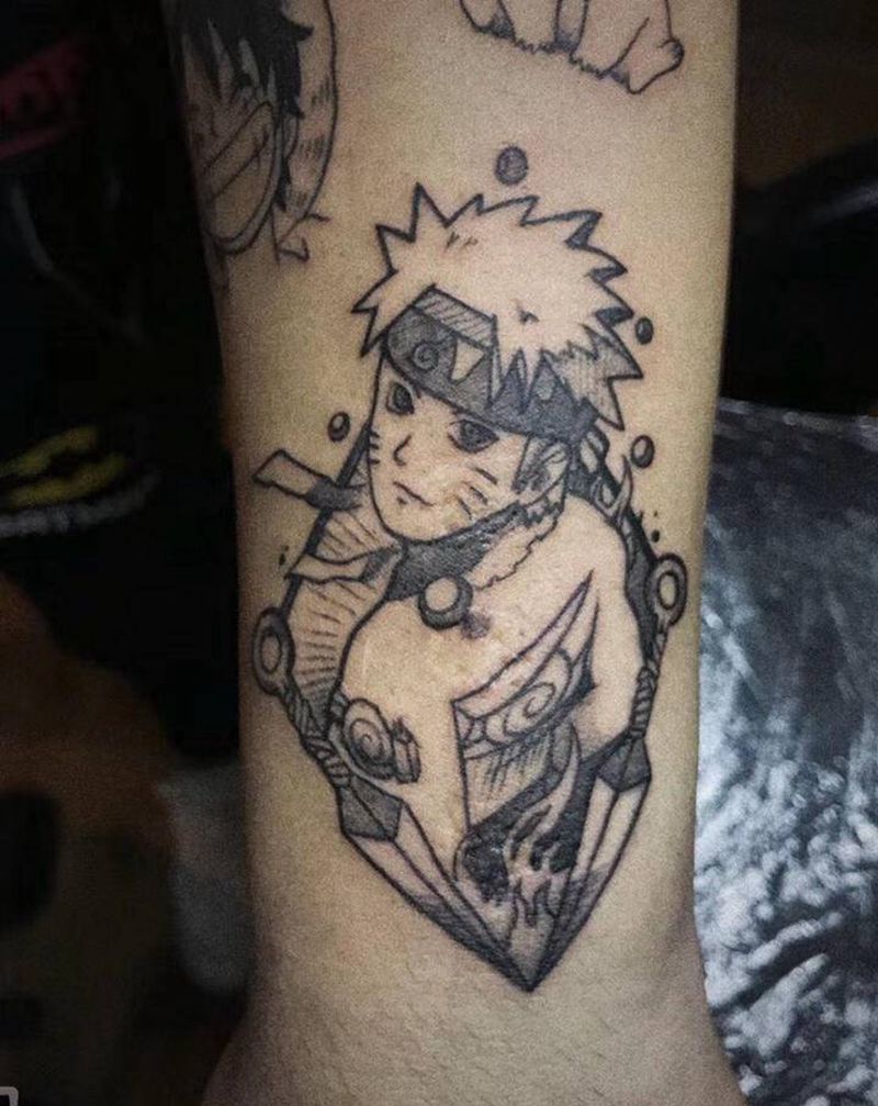 卡通纹身图片_手臂点刺纹身图案