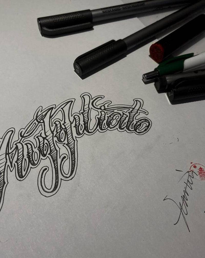 手稿-花体字纹身图片_手臂胸部花体字纹身图案