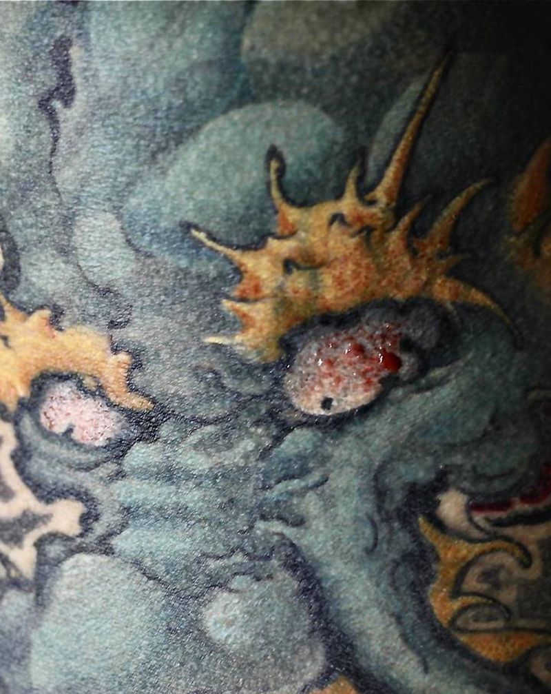 扎龙眼纹身图片_手臂新传统纹身图案