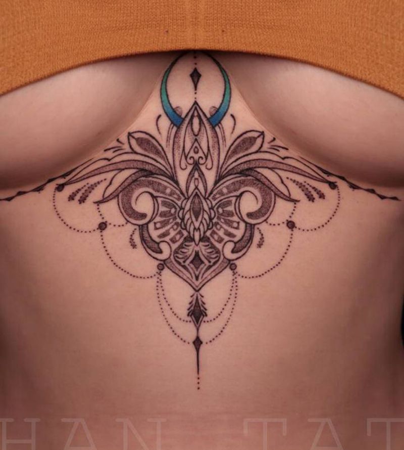 胸下纹身纹身图片_胸部点刺纹身图案