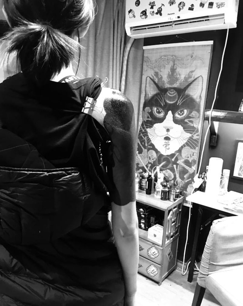 黑臂纹身图片_手臂纹身图案