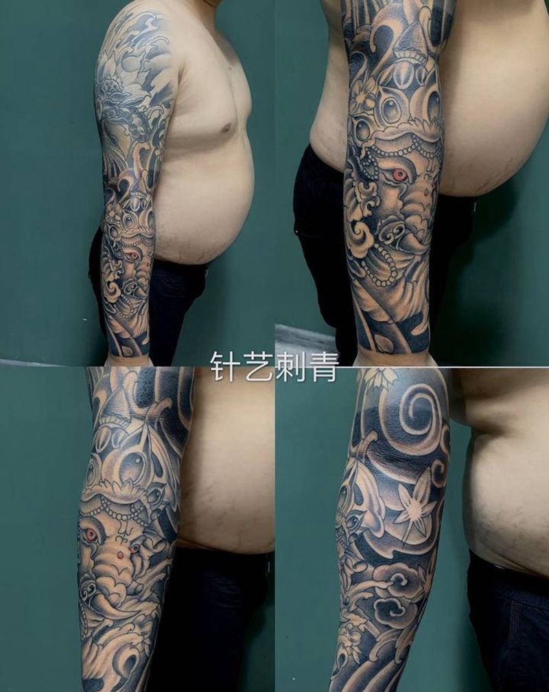 接花臂纹身图片_手臂纹身图案