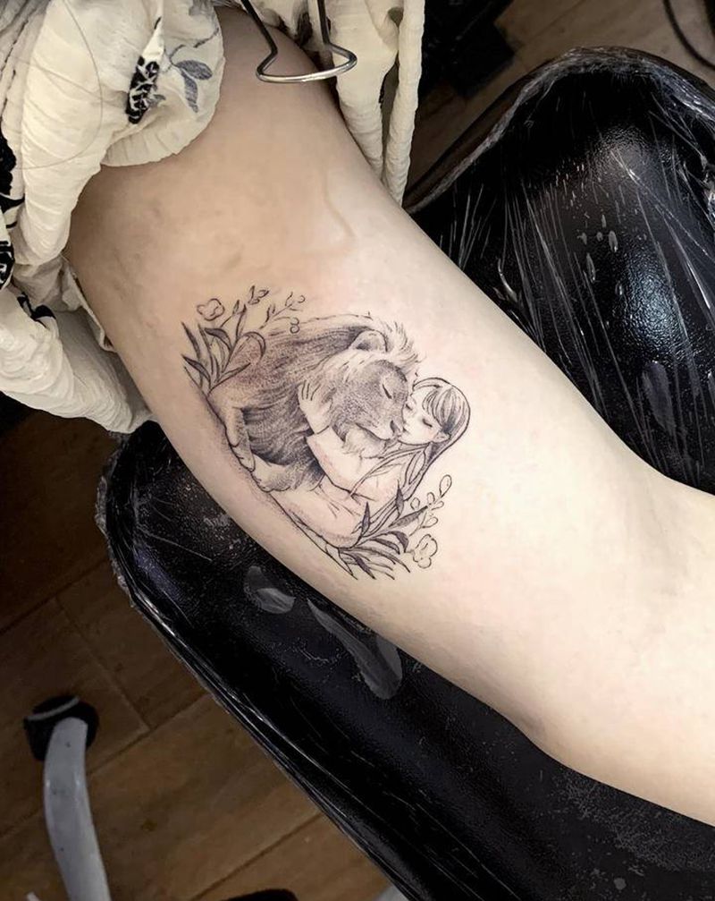 小狮子纹身图片_手臂点刺纹身图案