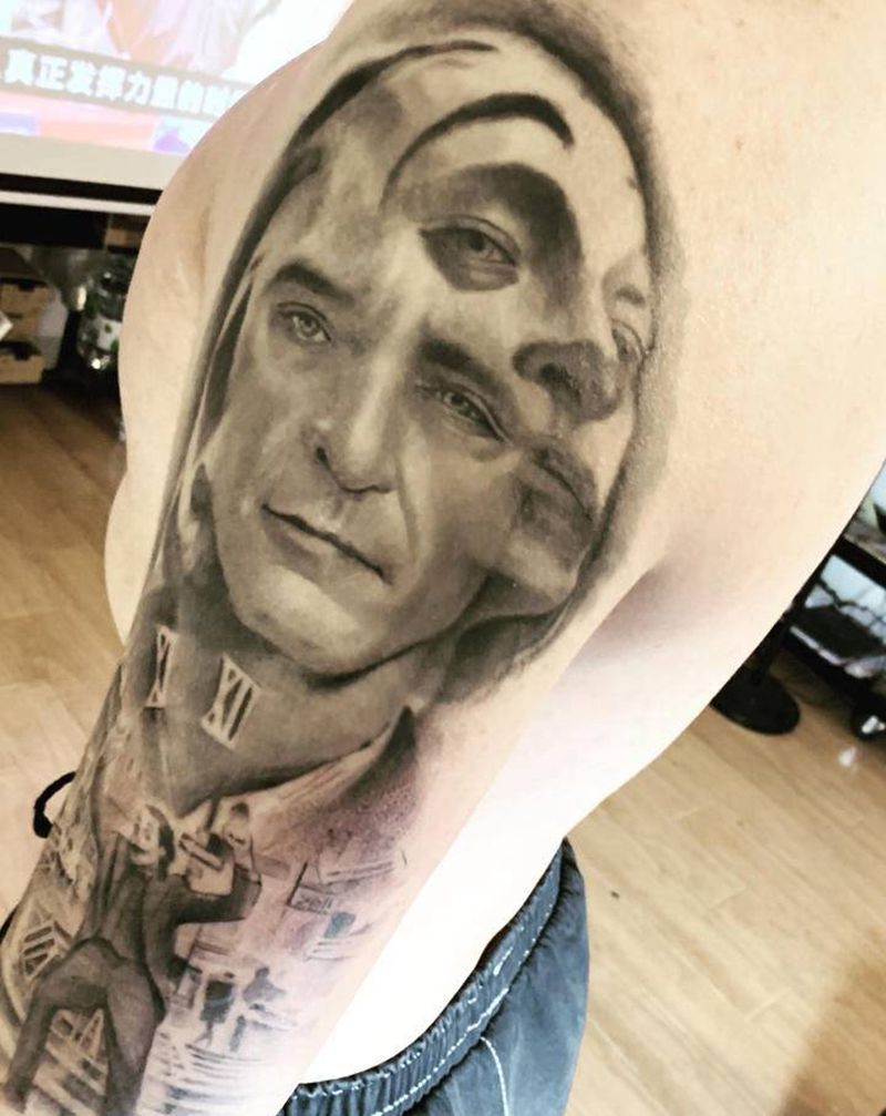 小丑纹身图片_手臂欧美写实纹身图案