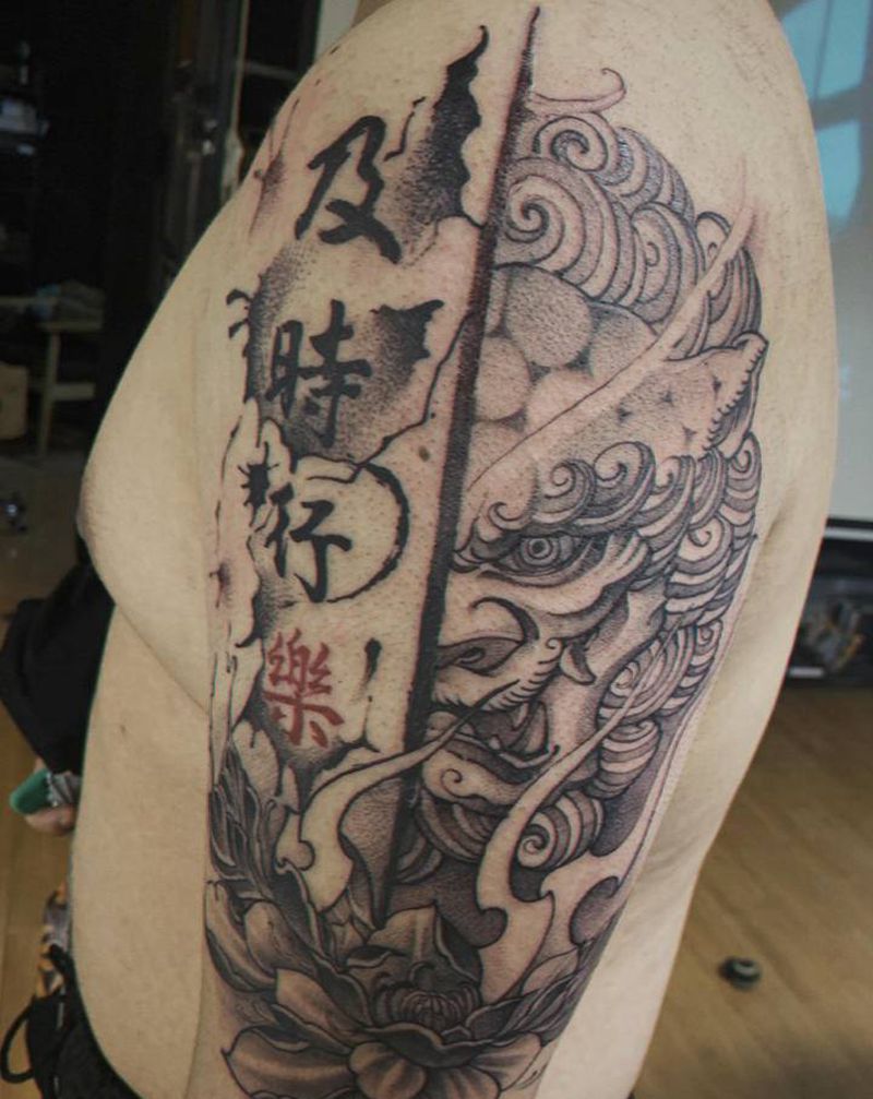 大臂唐狮纹身图片_手臂新传统纹身图案