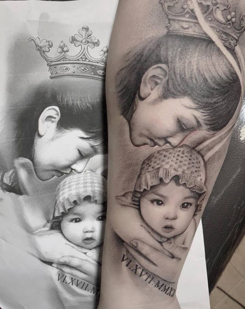 呵护纹身图片_手臂欧美写实纹身图案