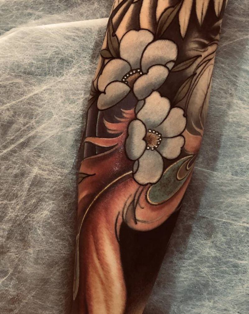 凤凰花臂纹身图片_手臂新传统凤凰纹身图案