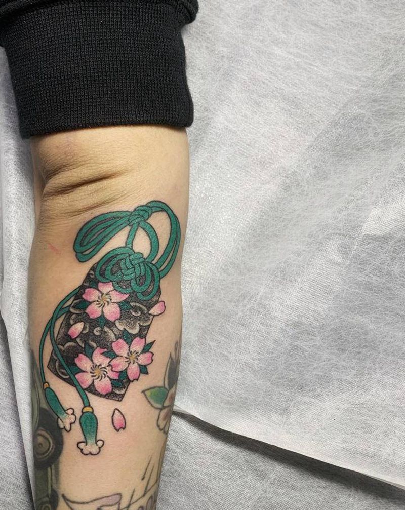 福袋纹身纹身图片_手臂点刺纹身图案