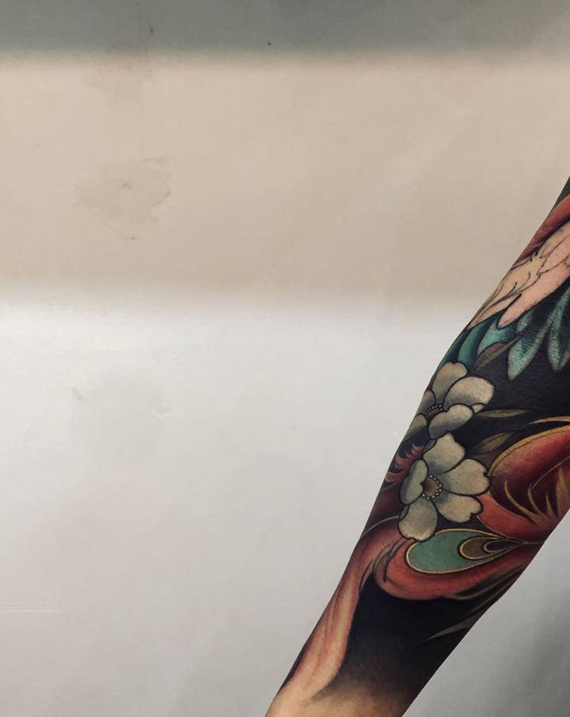 花臂纹身图片_手部手臂新传统凤凰纹身图案