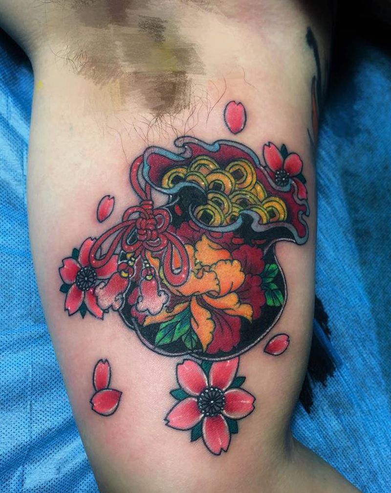 福袋纹身纹身图片_手臂新传统纹身图案