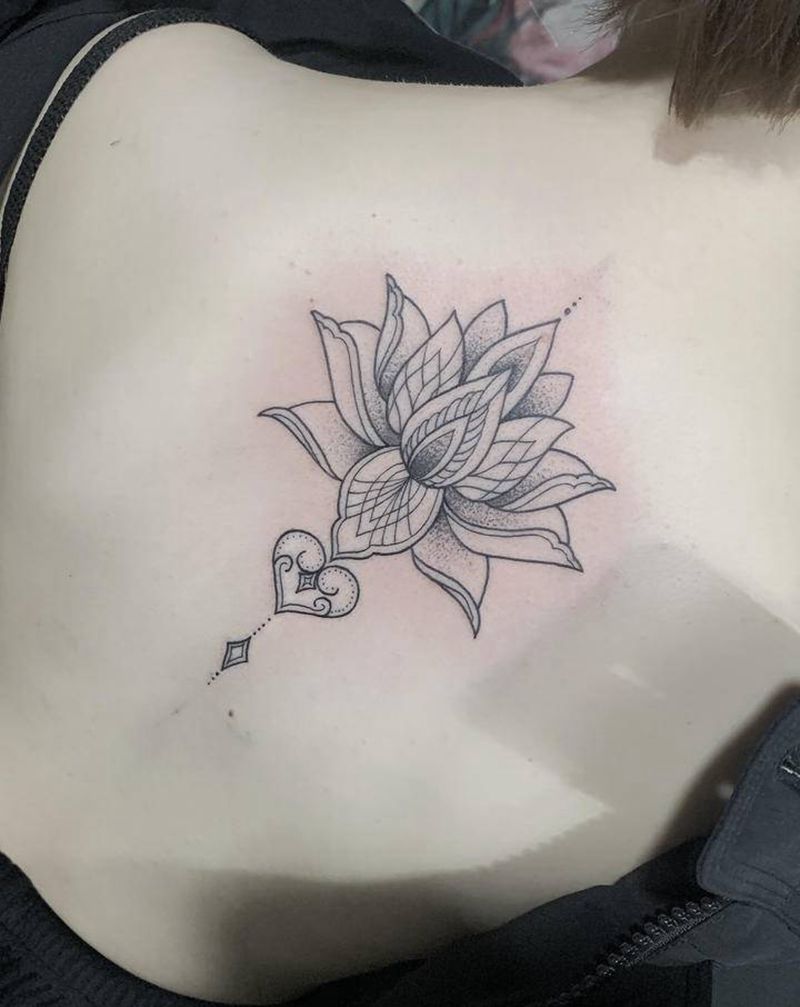 经典脊椎梵花纹身纹身图片_背部几何点刺纹身图案