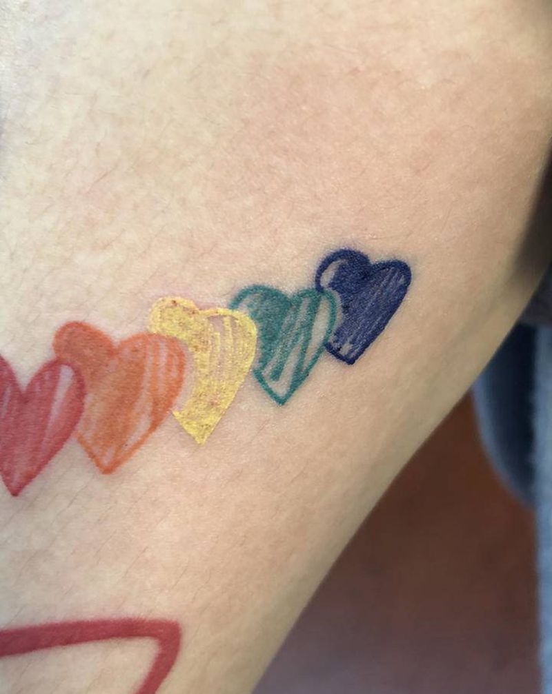 蜡笔画纹身图片_手臂水彩纹身图案