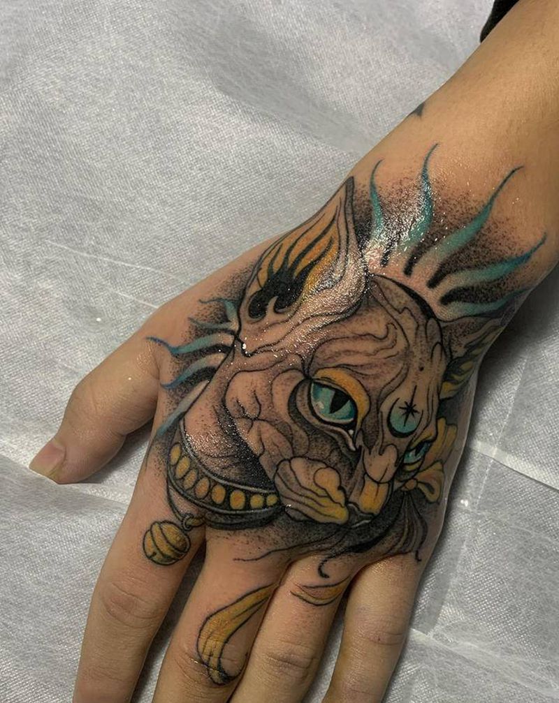 无毛猫手背纹身纹身图片_手部点刺纹身图案