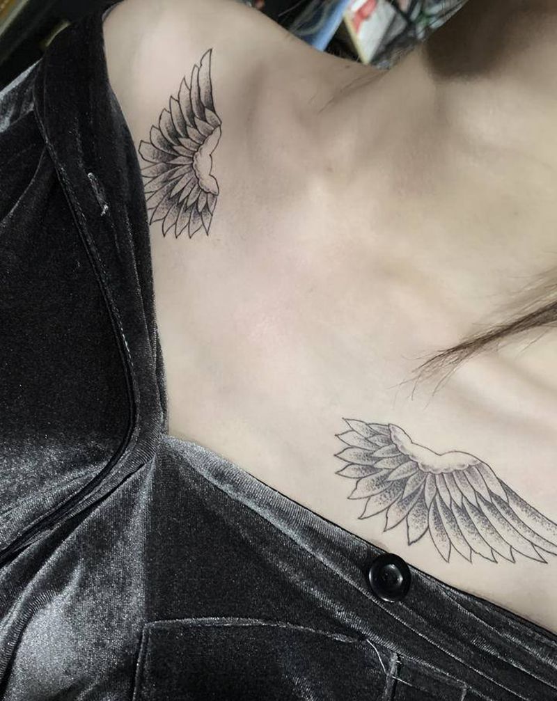 翅膀锁骨纹身纹身图片_胸部点刺纹身图案