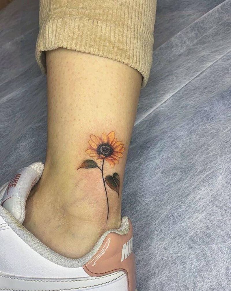 向日葵纹身图片_腿部纹身图案