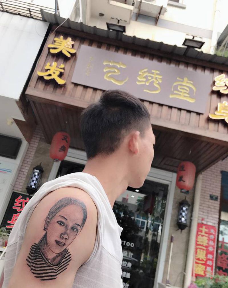 人物纹身图片_手臂纹身图案