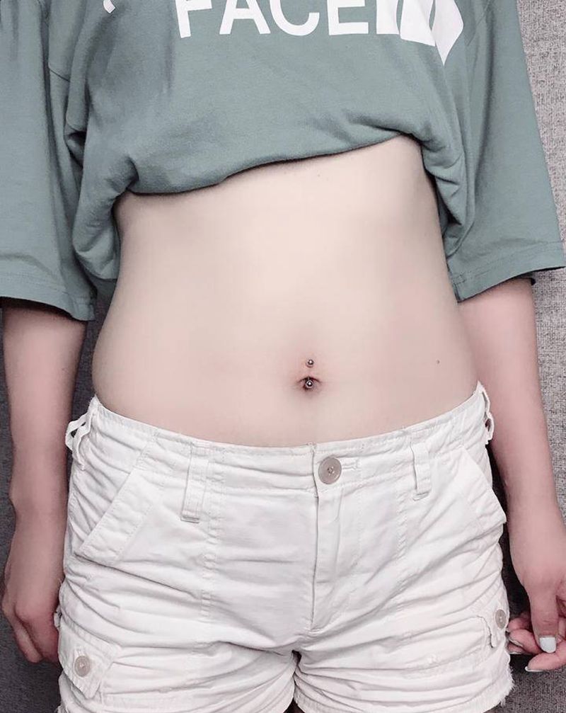 穿孔脐钉纹身图片_腹部穿孔脐钉纹身图案