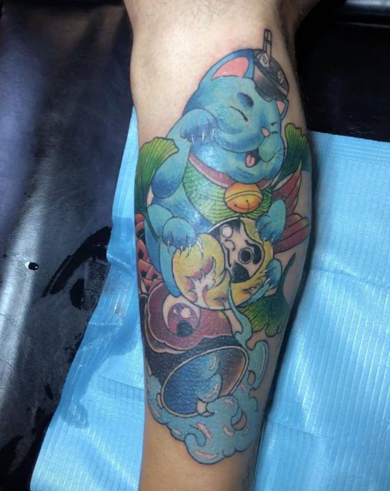 招财猫纹身图片_腿部新传统纹身图案